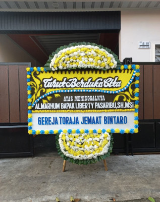 Papan Bunga Duka di Wara Selatan
